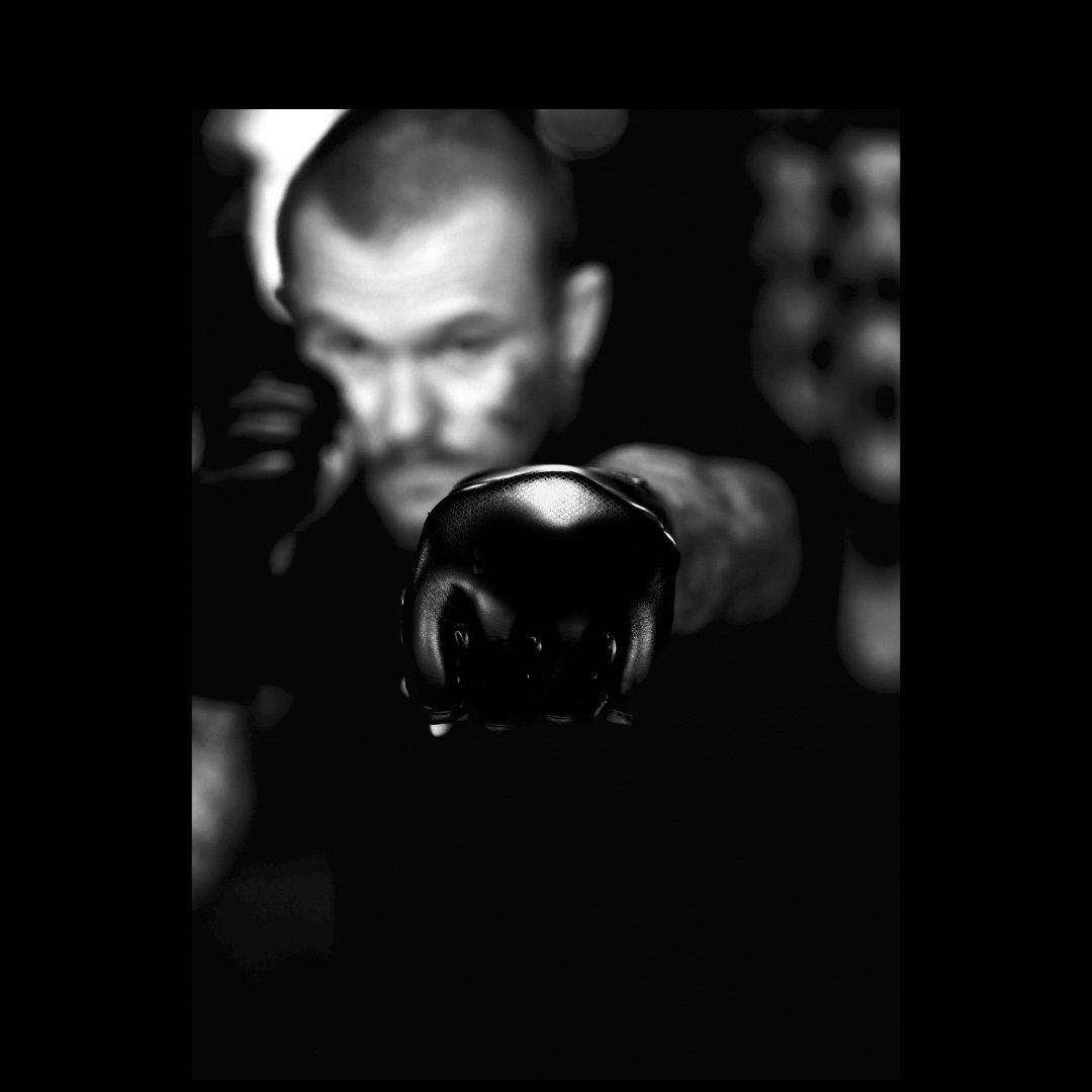 Shaun “Beastman” Anderson mid-strike, black and white portrait